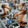 Image of robotic arms at work to illustrate the blog post "Wisconsin Manufacturers Are Using AI" that discusses AI in Manufacturing. Industrial Marketing; AI Marketing.